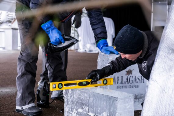 A ice sculptor carves out an piece for the annual Glacier Ice Bar.